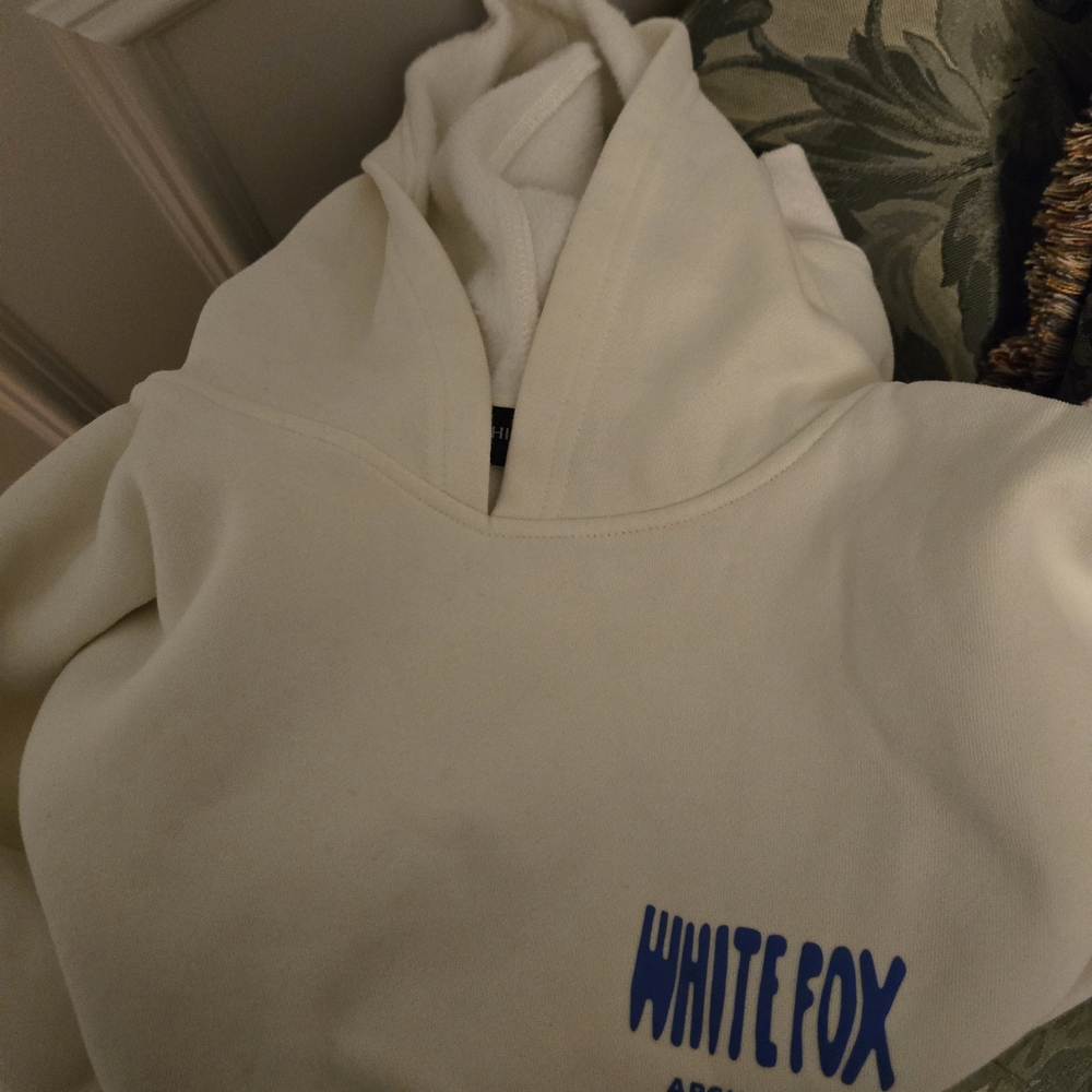 White Fox Boutique Cream Hoodie with Blue Logo